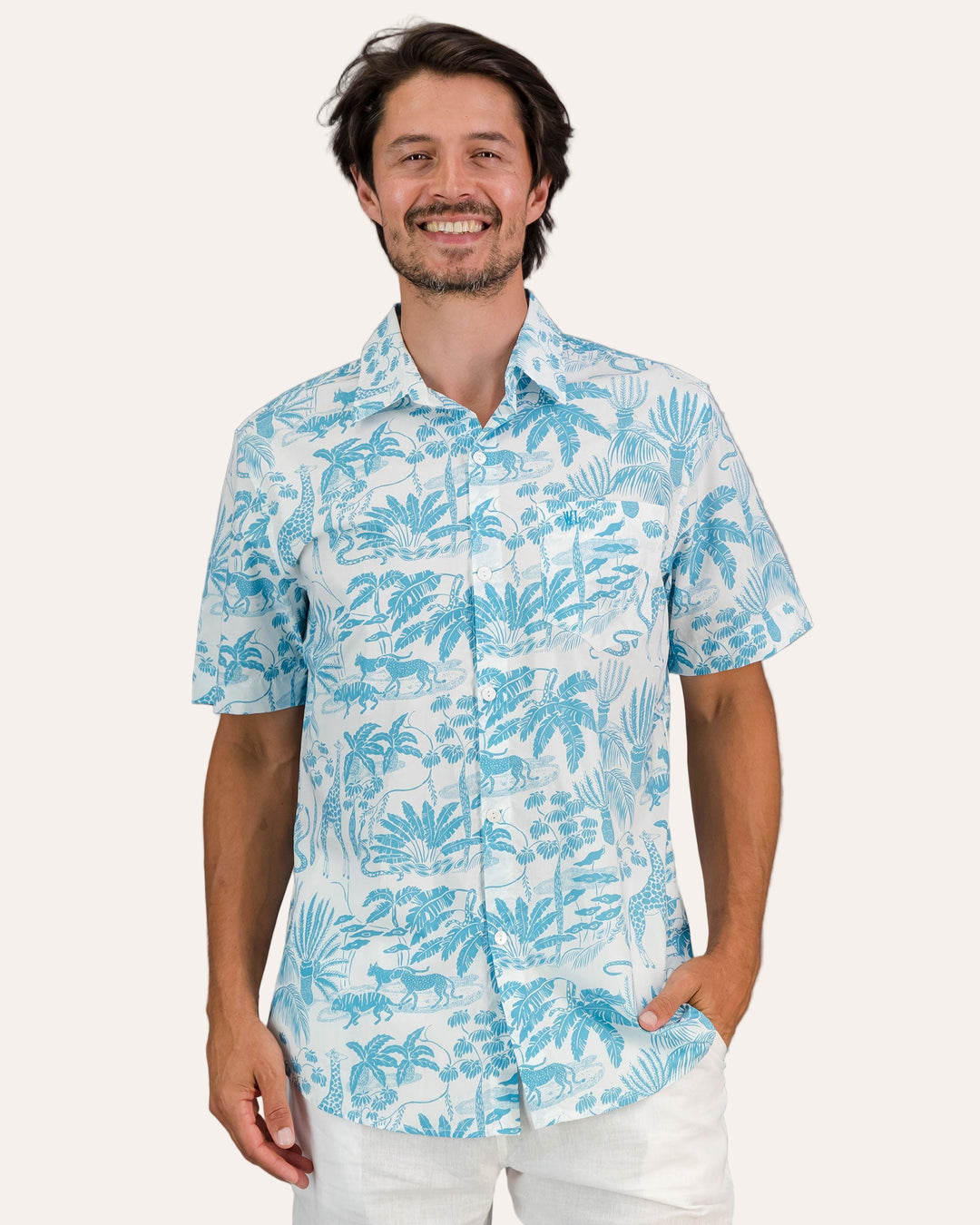 Man wearing a Mens Holiday Shirt - Blue Mono Safari on White against a gray background