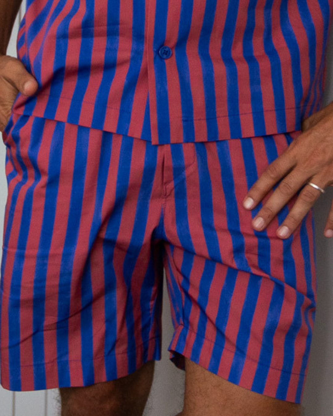 Red and blue striped organic cotton pyjama shorts with side pockets