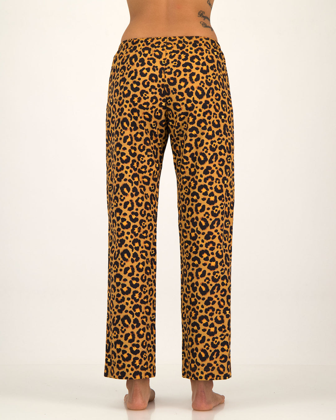 Leopard print lounge pants on a white background
