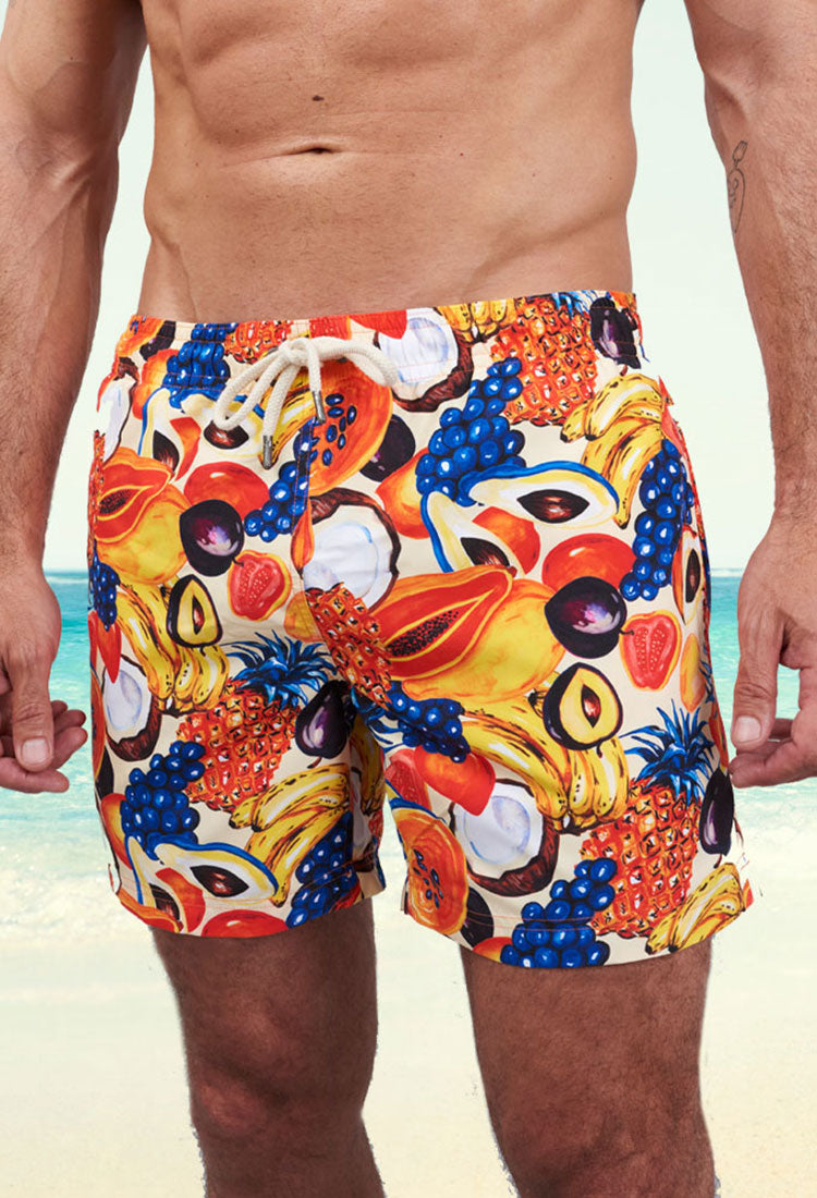 Man wearing Woodstock Laundry swimwear on the beach