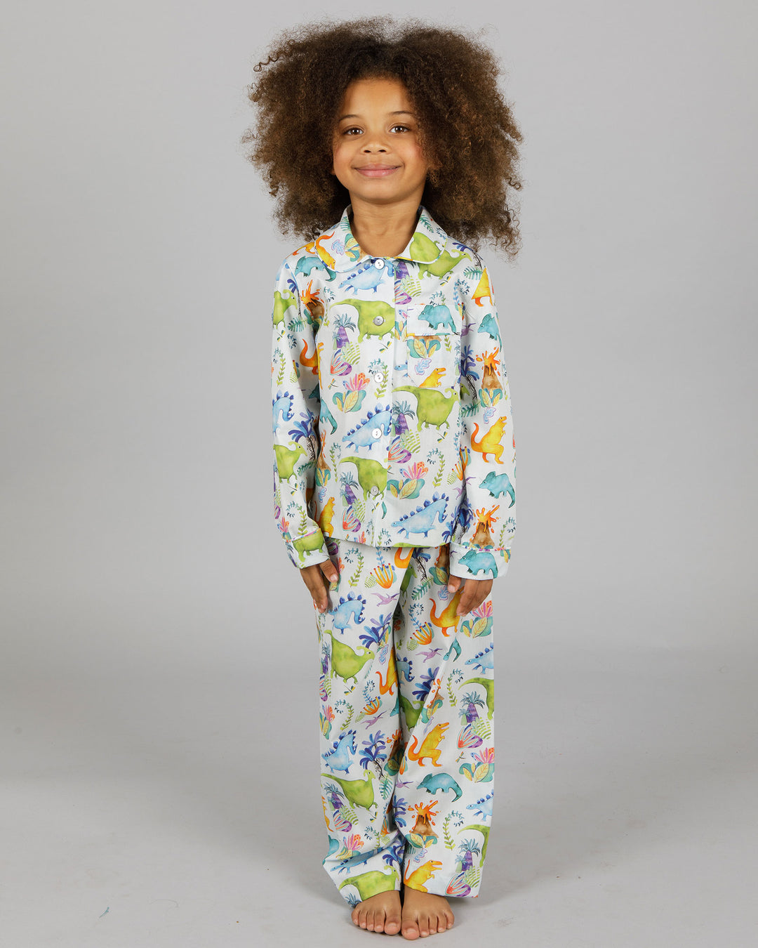 Girls Long Pyjamas Dinosaurs Blue Front - Woodstock Laundry