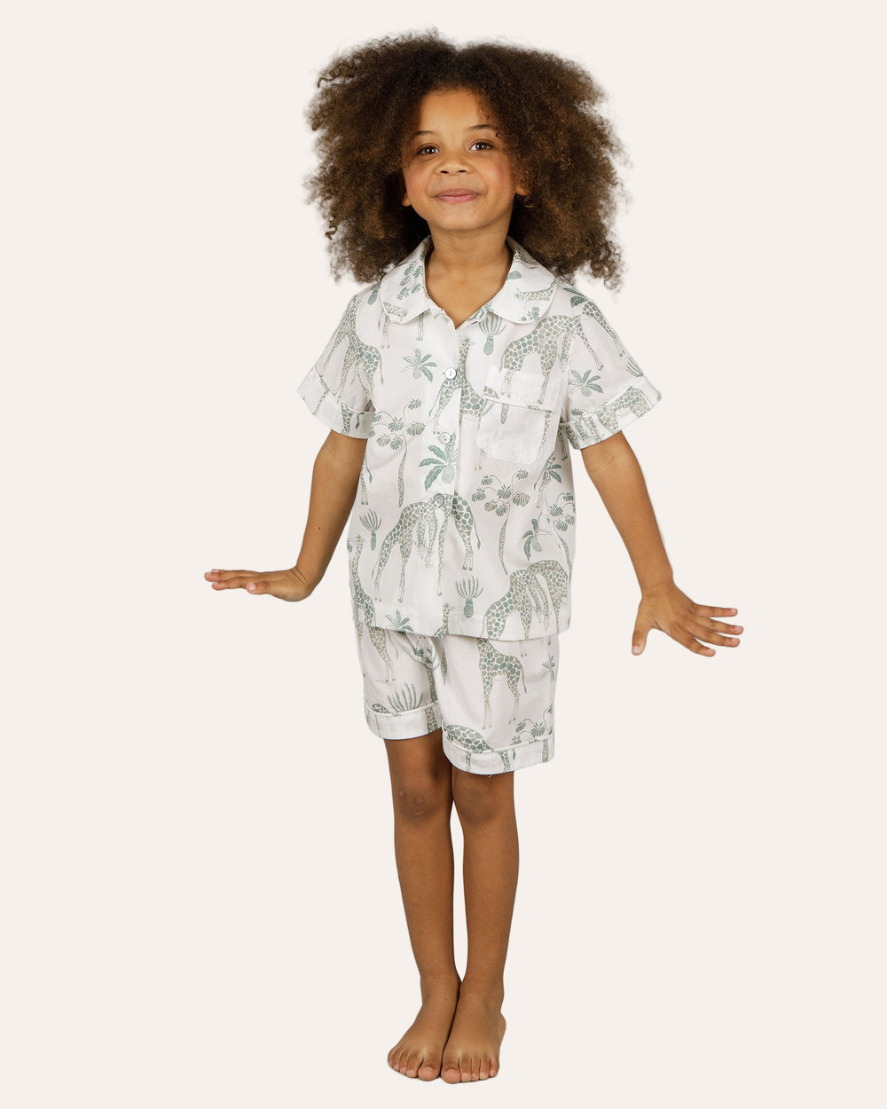 Girls Short Pyjamas Giraffes Green Front - Woodstock Laundry